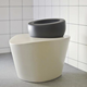 Illustration for article titled 8 Heated, Humming, or Just Plain Strange Toilets from the Future